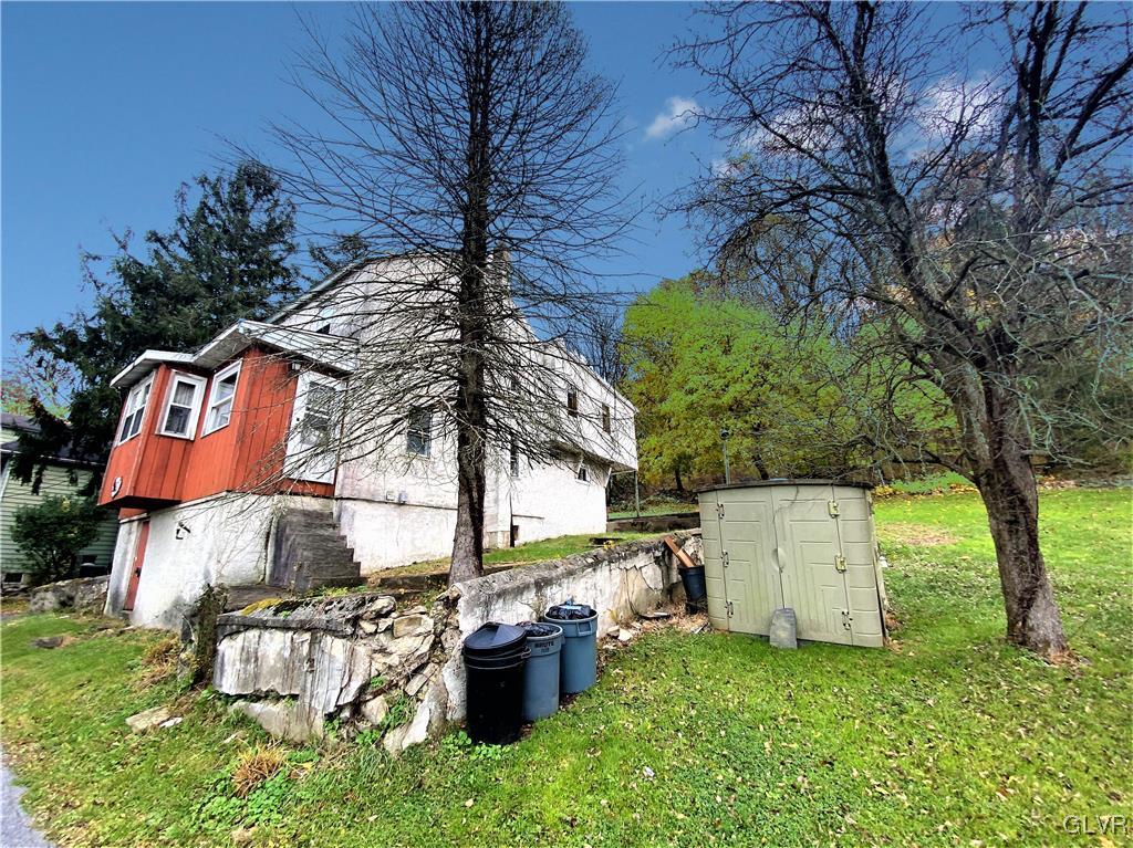 2102 Nemeth Drive Bethlehem, PA 18015 - Photo 4 of 33 a view of backyard with a barn and a large tree