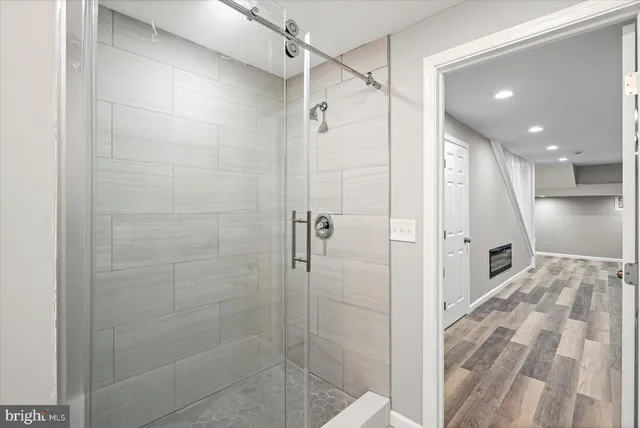 a view of a hallway with washer and dryer
