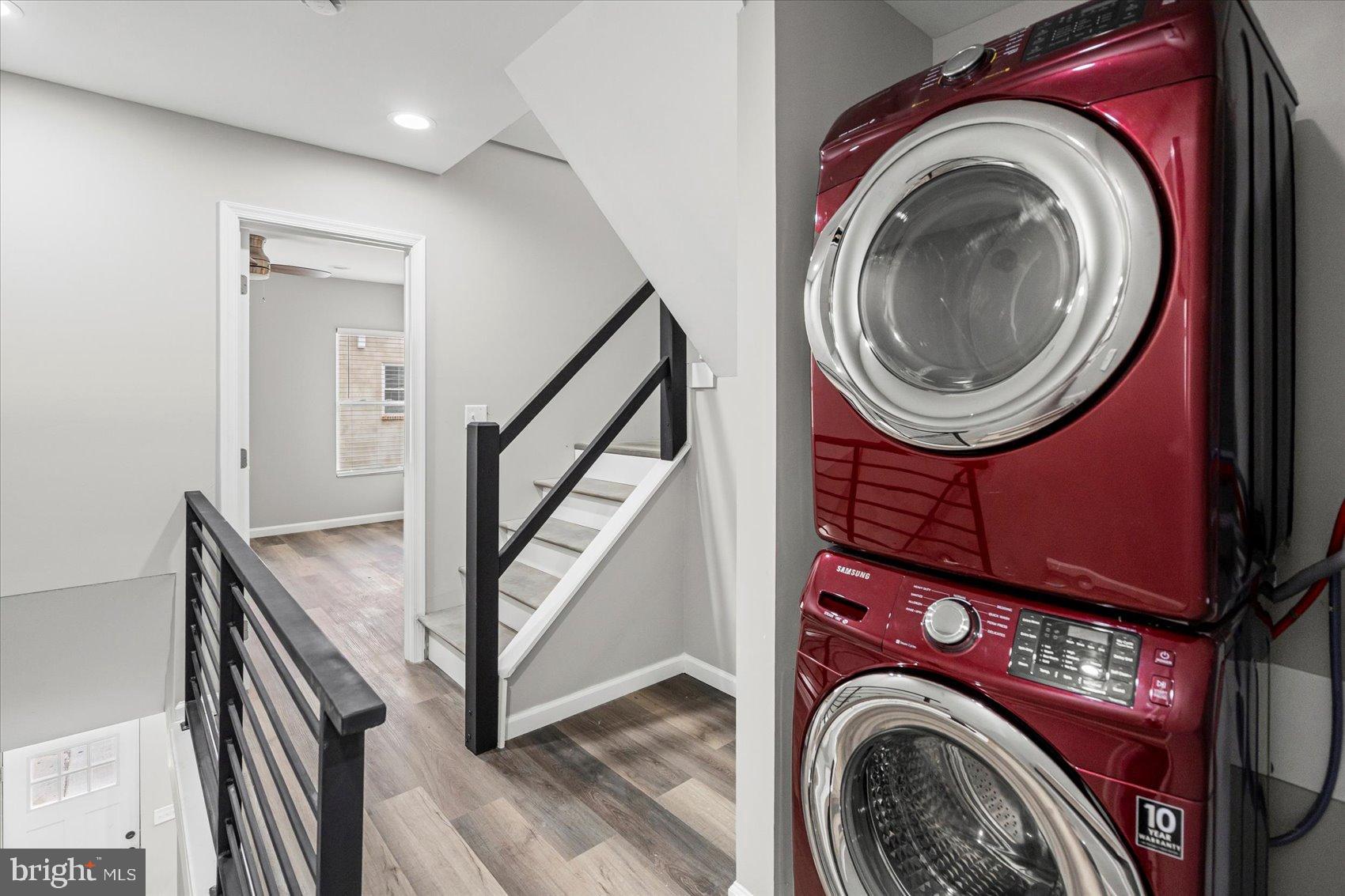 407 Pitman Place Baltimore, MD 21202 - Photo 18 of 42 a view of a hallway with washer and dryer