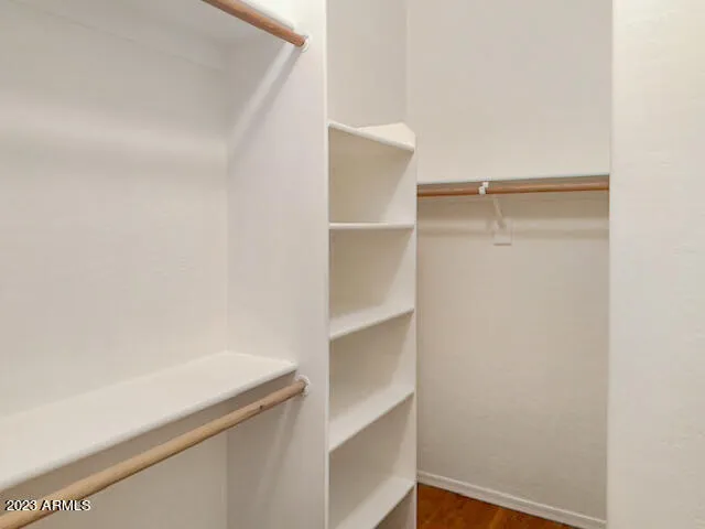a view of an empty walk in closet