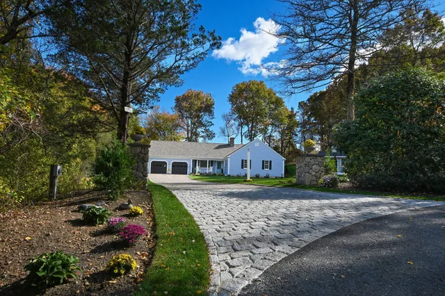 a house view with a garden space