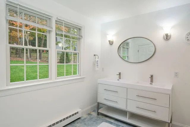 a swimming pool with green garden