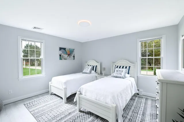 a backyard of a house with lots of green space