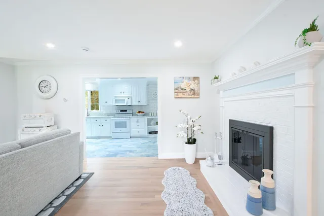 a kitchen with sink cabinets and window