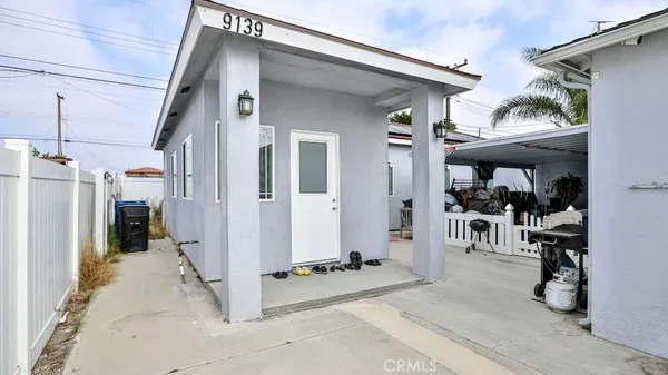 a view of a house with glass doors