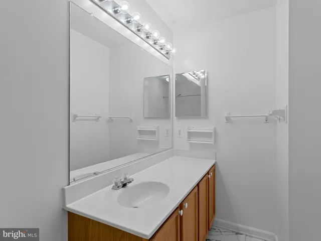a bathroom with a toilet and shower