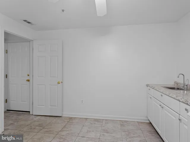 a view of a room with an empty space