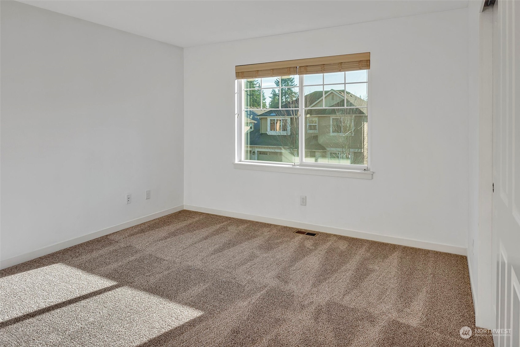 4812 Northeast 2nd Place Renton, WA 98059 - Photo 21 of 26 an empty room with a window