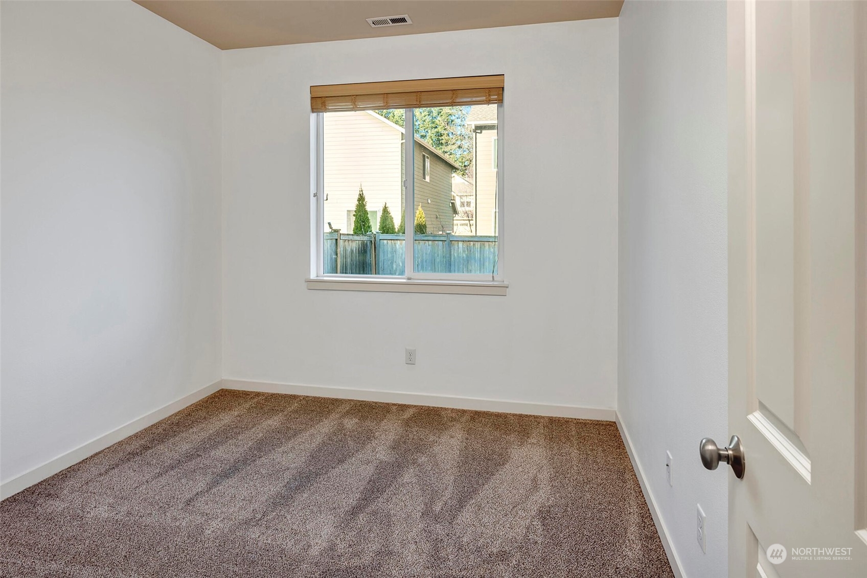 4812 Northeast 2nd Place Renton, WA 98059 - Photo 23 of 26 an empty room with a window