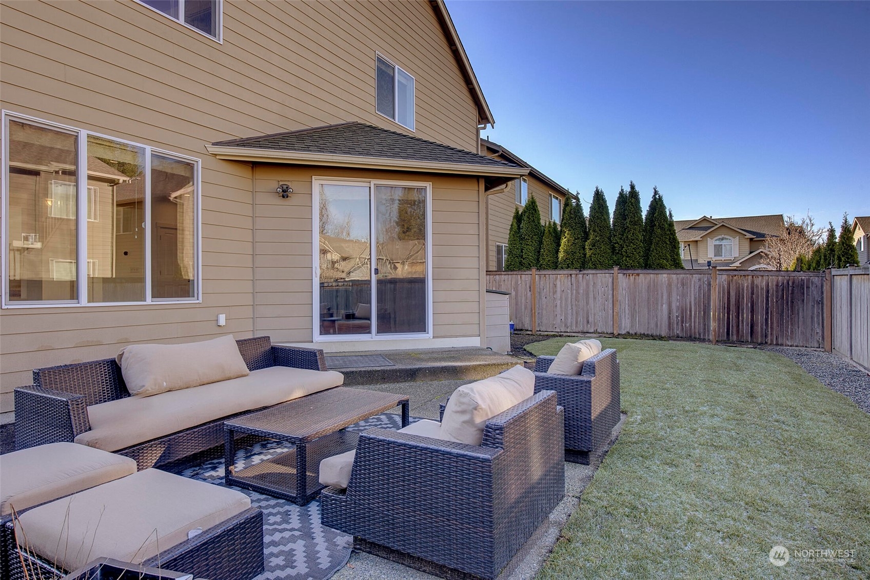 4812 Northeast 2nd Place Renton, WA 98059 - Photo 25 of 26 a backyard of a house with table and chairs