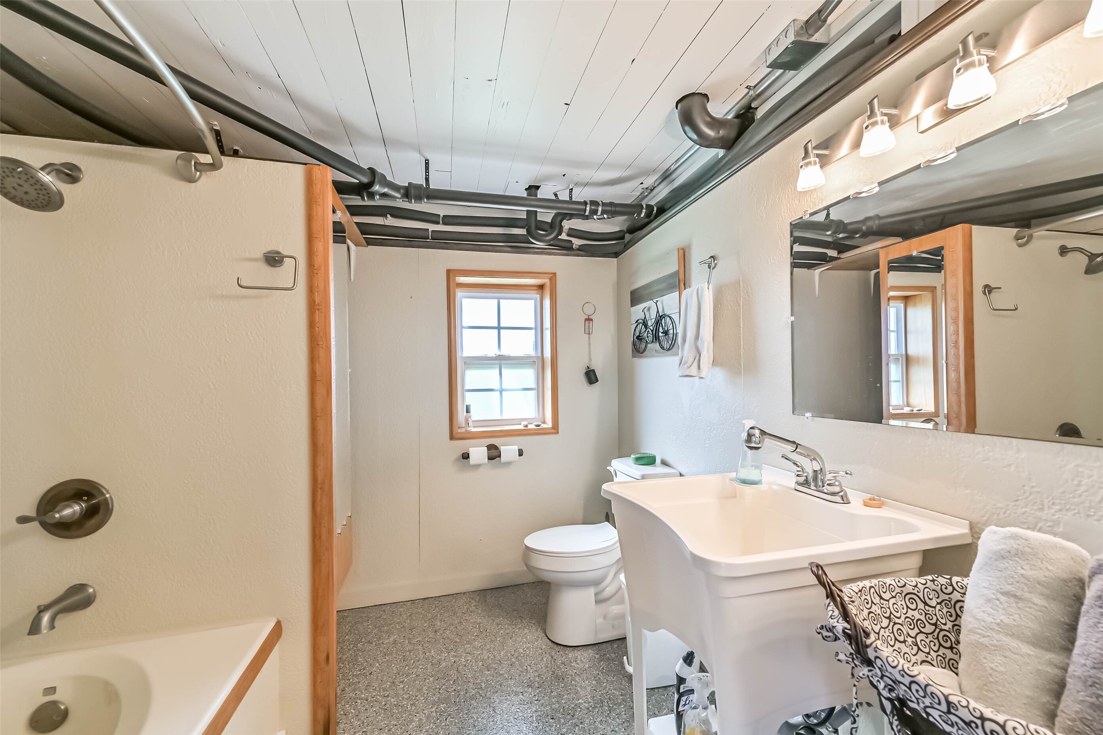 2009 Todville Road Seabrook, TX 77586 - Photo 36 of 46 a spacious bathroom with a granite countertop sink a toilet and shower
