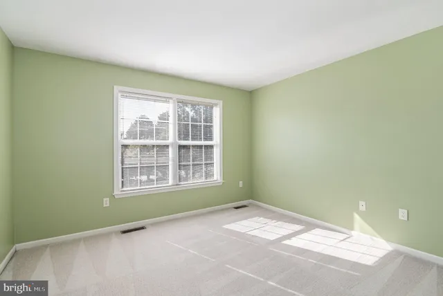 a view of a room with a window