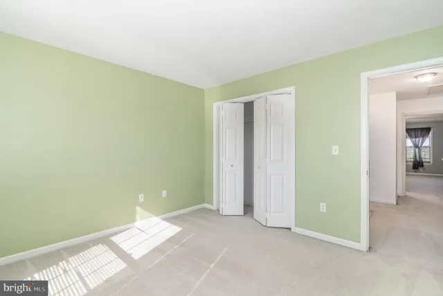 an empty room with closet