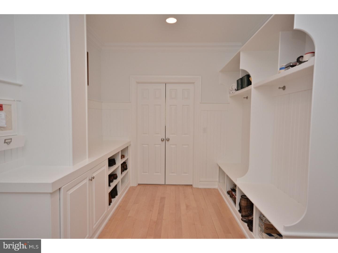 4571 Province Line Road Princeton, NJ 08540 - Photo 12 of 25 a kitchen with cabinets and wooden floor