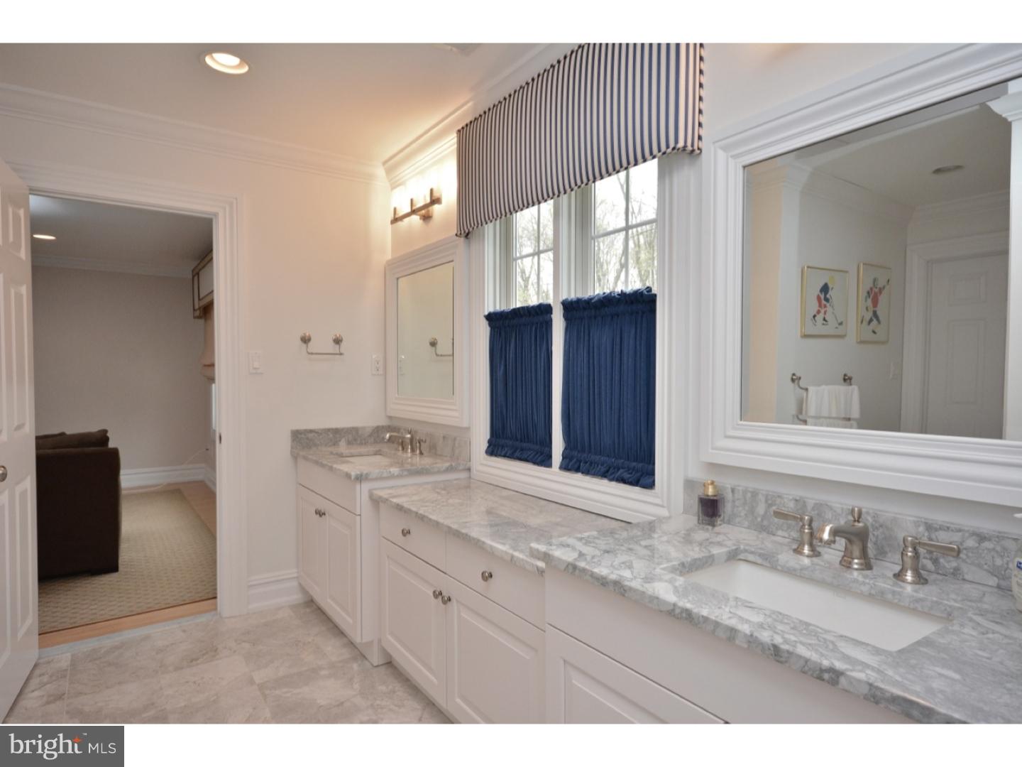 4571 Province Line Road Princeton, NJ 08540 - Photo 20 of 25 a bathroom with a granite countertop double vanity sink and a mirror