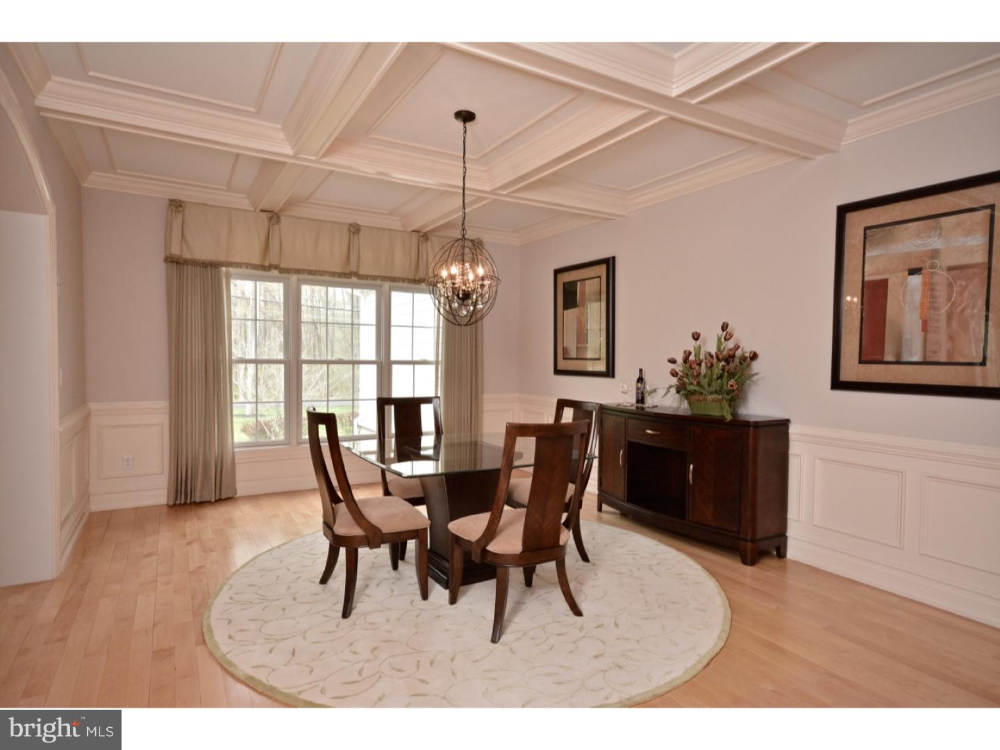4571 Province Line Road Princeton, NJ 08540 - Photo 5 of 25 a dining room with furniture a chandelier and wooden floor