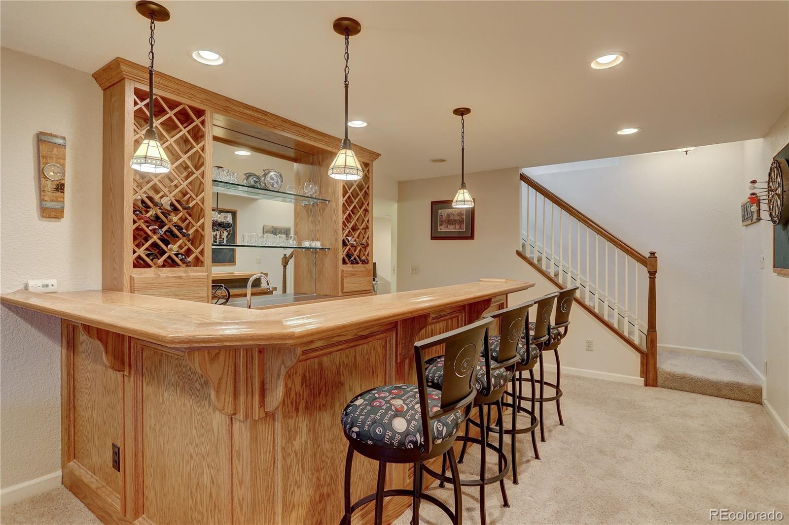 431 Mountain Chickadee Road Highlands Ranch, CO 80126 - Photo 27 of 38 a view of a dining room and chairs in the patio