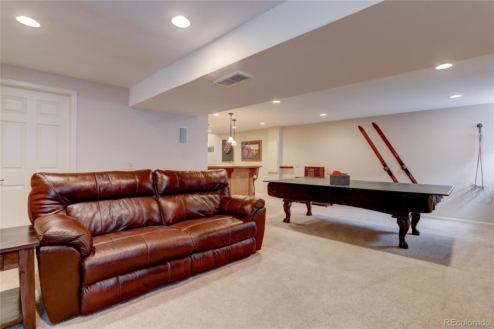 431 Mountain Chickadee Road Highlands Ranch, CO 80126 - Photo 30 of 38 a living room with furniture