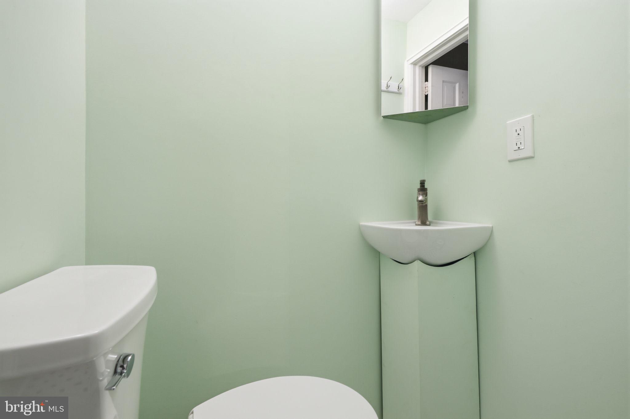 404 Old Farm Road Wyncote, PA 19095 - Photo 19 of 41 Fresh and serene powder room retreat.