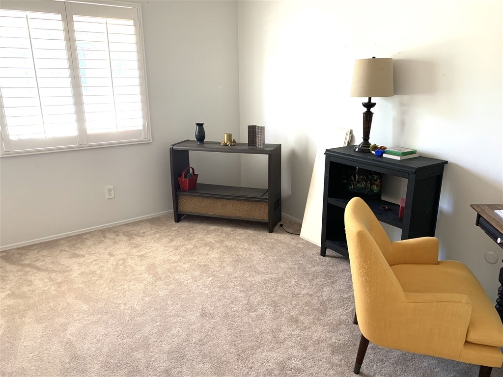 62 Pepper Tree Road Chula Vista, CA 91910 - Photo 14 of 17 a bedroom with furniture and a window