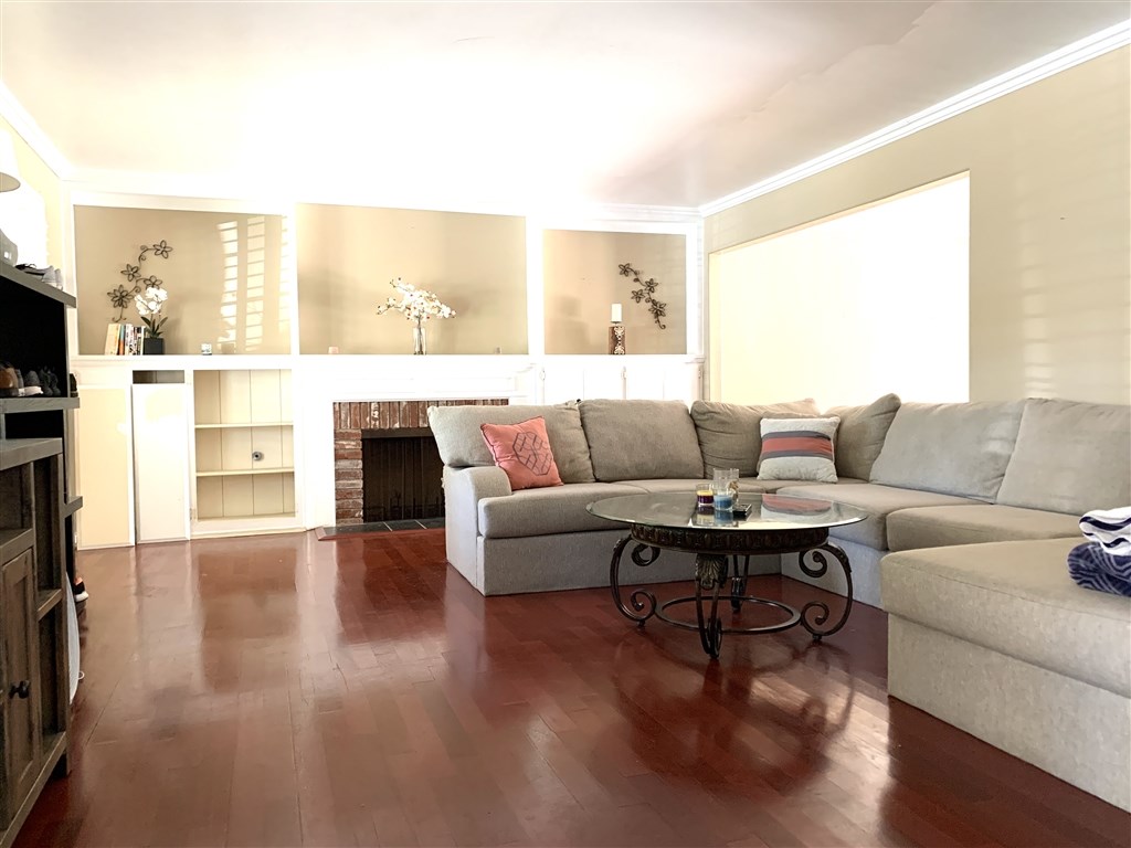 62 Pepper Tree Road Chula Vista, CA 91910 - Photo 7 of 17 a living room with furniture and a large window