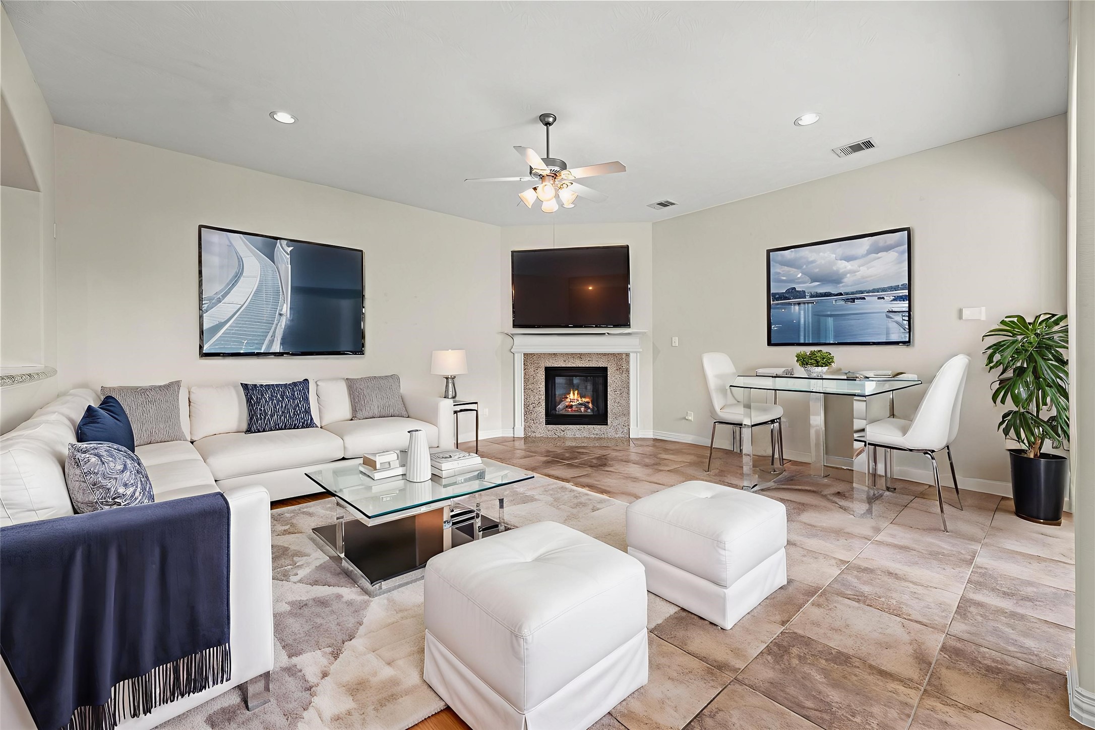 3315 Tulip Ranch Drive Katy, TX 77494 - Photo 3 of 23 Discover the heart of the home in this living area where the open layout and corner fireplace create the ultimate space for gathering. The living room is virtually staged so you can imagine the possibilities.