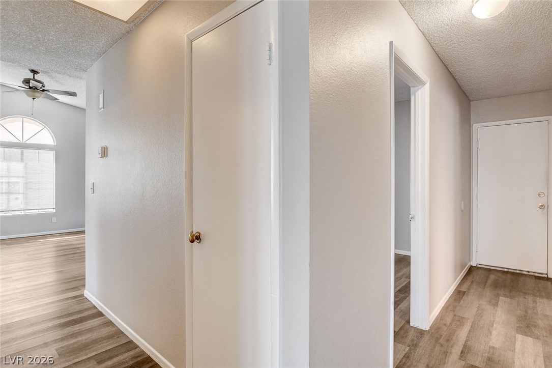 6209 Warm River Road Las Vegas, NV 89108 - Photo 25 of 39 Streamlined hall entry leading to bright living spaces, perfect for seamless transitions.