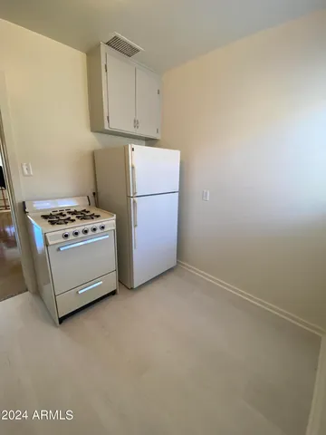 a utility room with washer and dryer