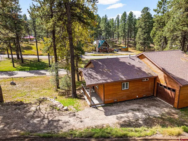 a view of backyard with green space
