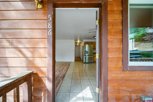 a view of a bathroom with a glass door
