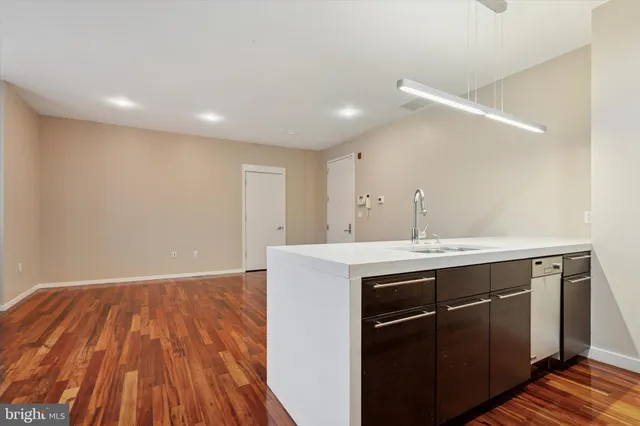 a kitchen with a stove and a microwave