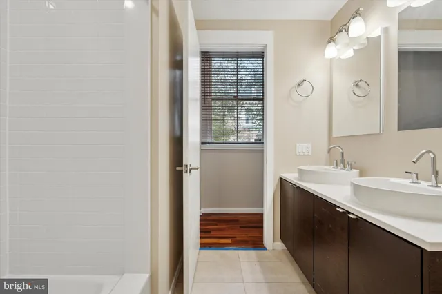 a view of a hallway with a wooden door