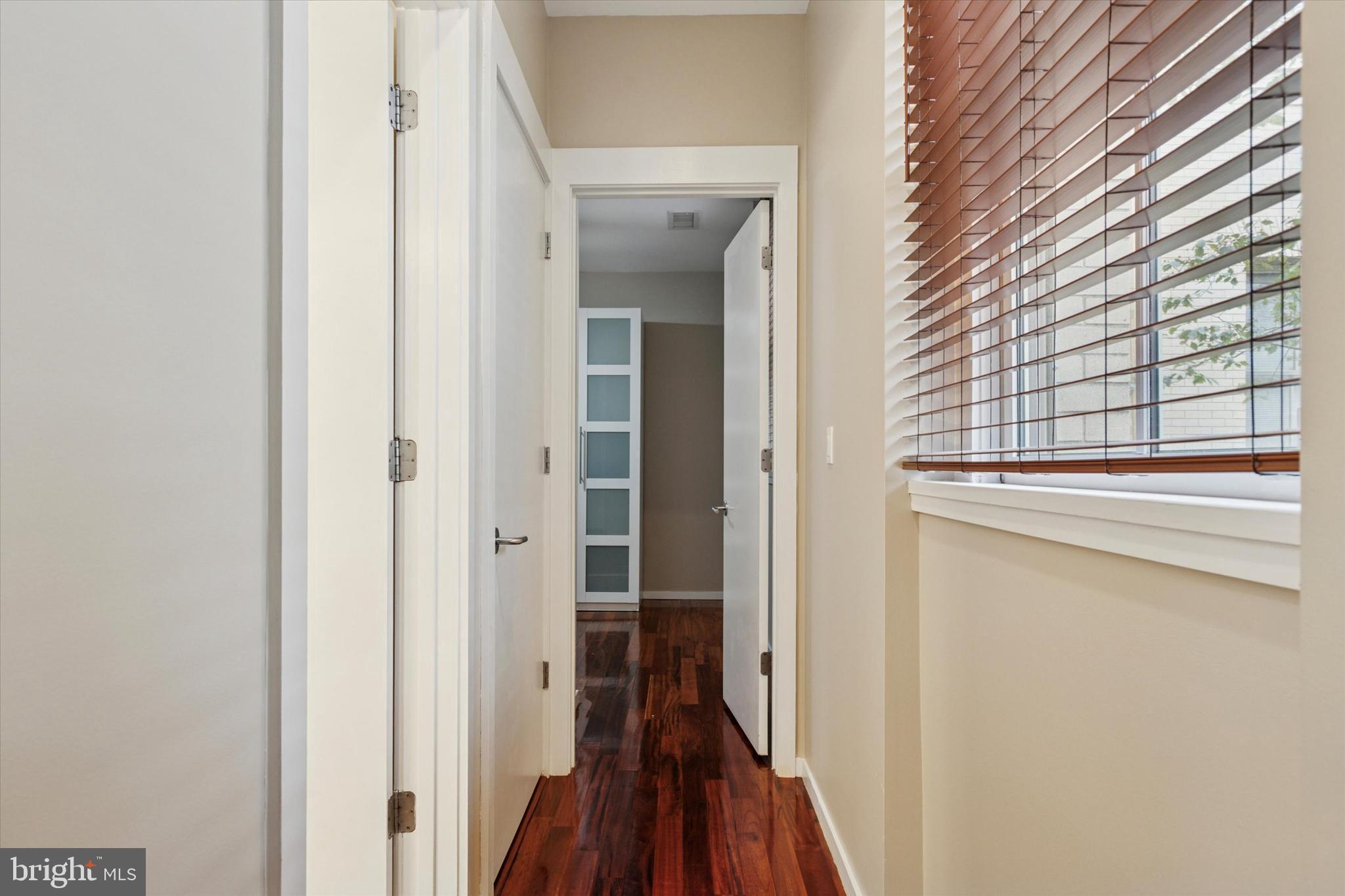 4200 Pine Street, Unit 103 Philadelphia, PA 19104 - Photo 27 of 35 a view of a hallway with a wooden door