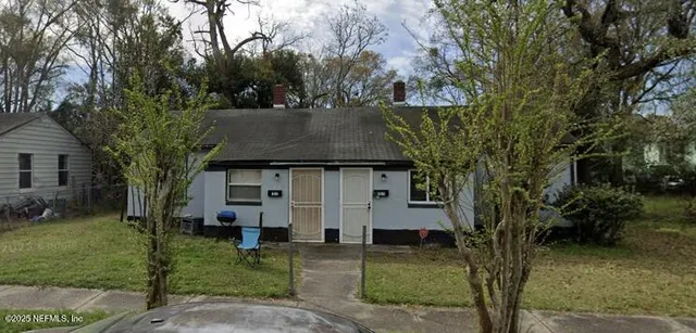 front view of house with a yard