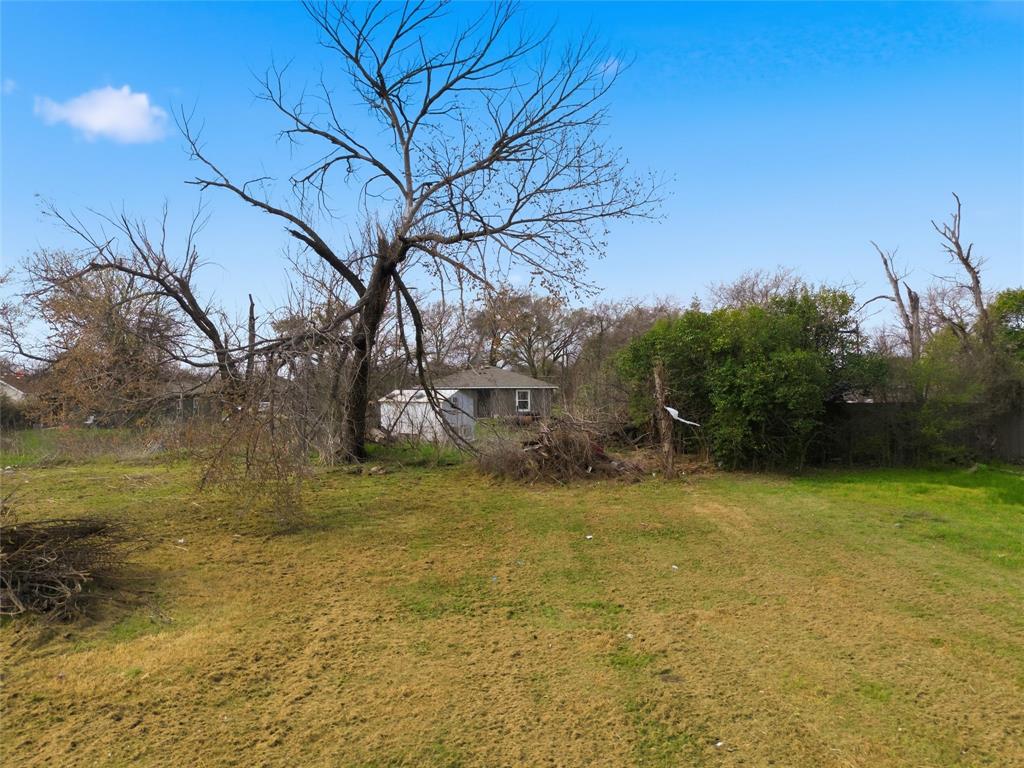 712 Miller Street Waco, TX 76704 - Photo 2 of 10 a view of a yard with a tree