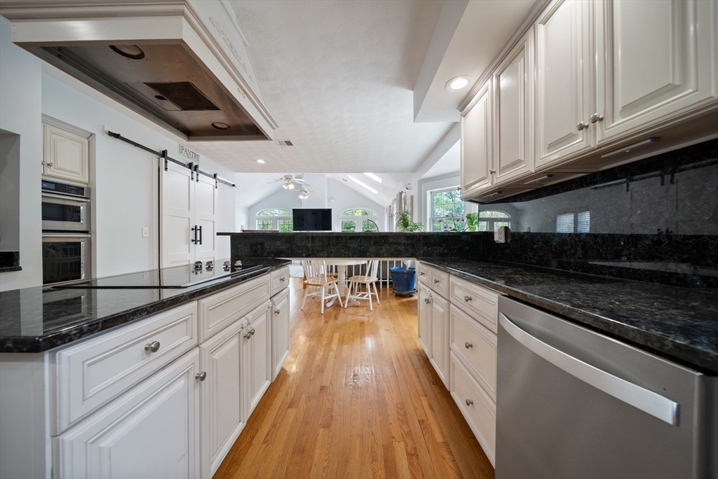 87 Hammersmith Drive Saugus, MA 01906 - Photo 12 of 37 a large kitchen with cabinets