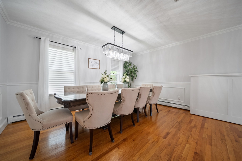 87 Hammersmith Drive Saugus, MA 01906 - Photo 17 of 37 a view of a dining room with furniture and wooden floor