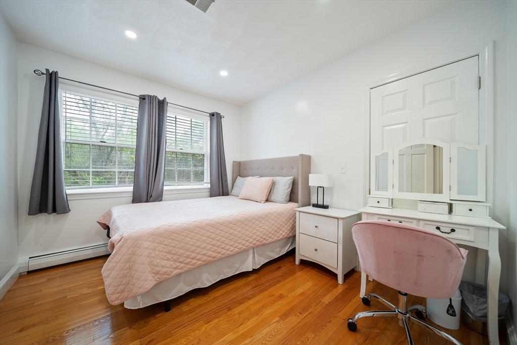 87 Hammersmith Drive Saugus, MA 01906 - Photo 31 of 37 a bedroom with a bed chair and a window