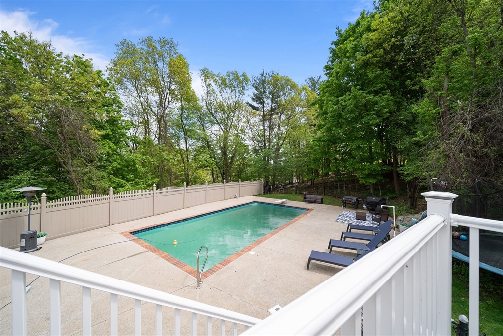 87 Hammersmith Drive Saugus, MA 01906 - Photo 35 of 37 a view of a terrace with trees