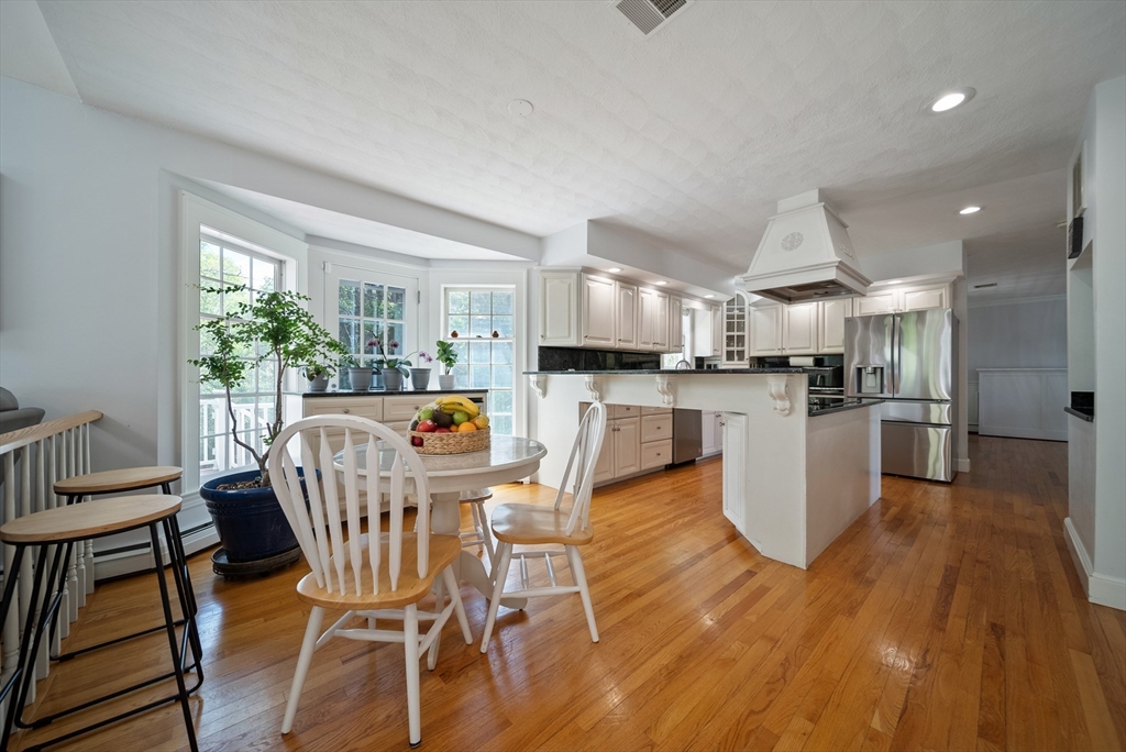 87 Hammersmith Drive Saugus, MA 01906 - Photo 10 of 37 a dining room with furniture and wooden floor