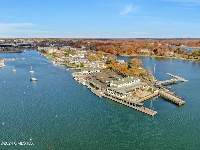 an empty room with closet and a bathroom