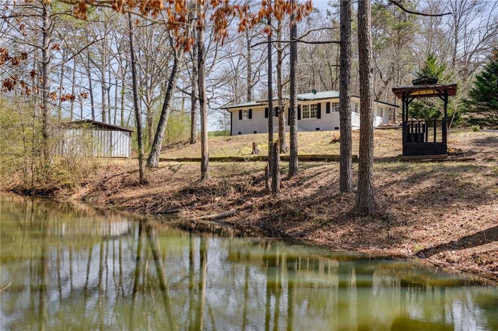 a backyard of a house with lots of green space
