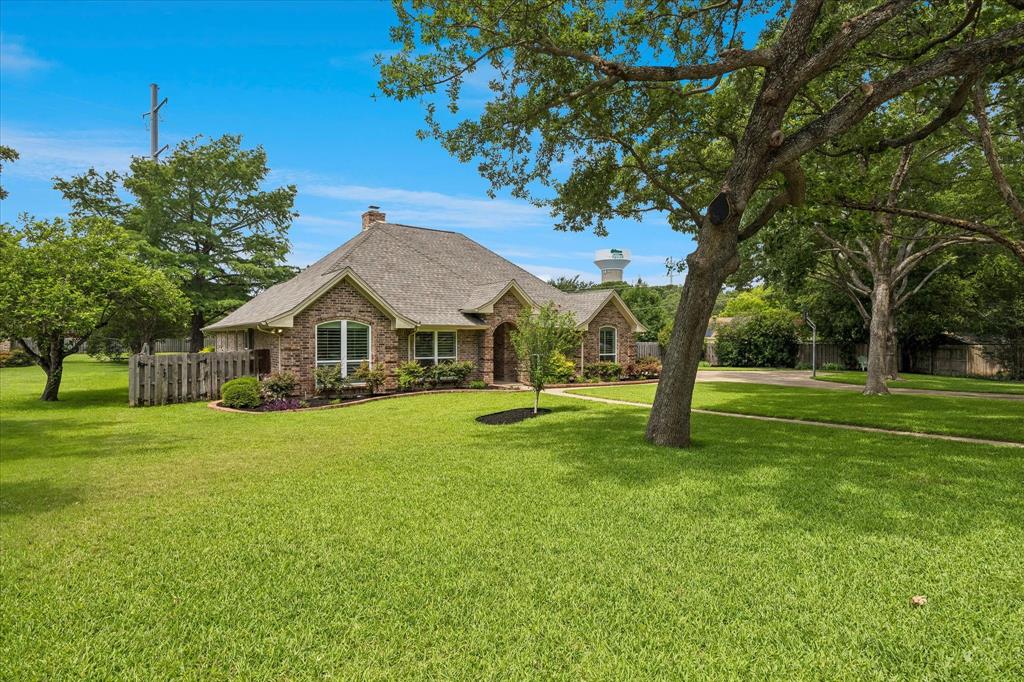 404 Moonlight Lane Keller, TX 76248 - Photo 39 of 40 a front view of house with yard and green space