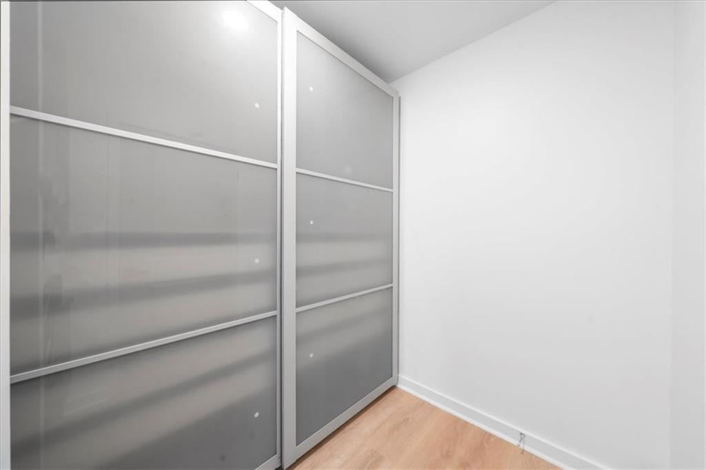 250 Pharr Road Northeast, Unit 704 Atlanta, GA 30305 - Photo 31 of 53 a view of an empty walk in closet