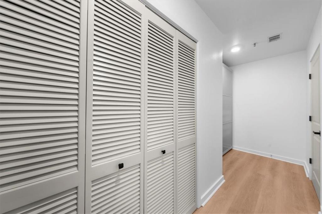 250 Pharr Road Northeast, Unit 704 Atlanta, GA 30305 - Photo 33 of 53 a view of a room with a door
