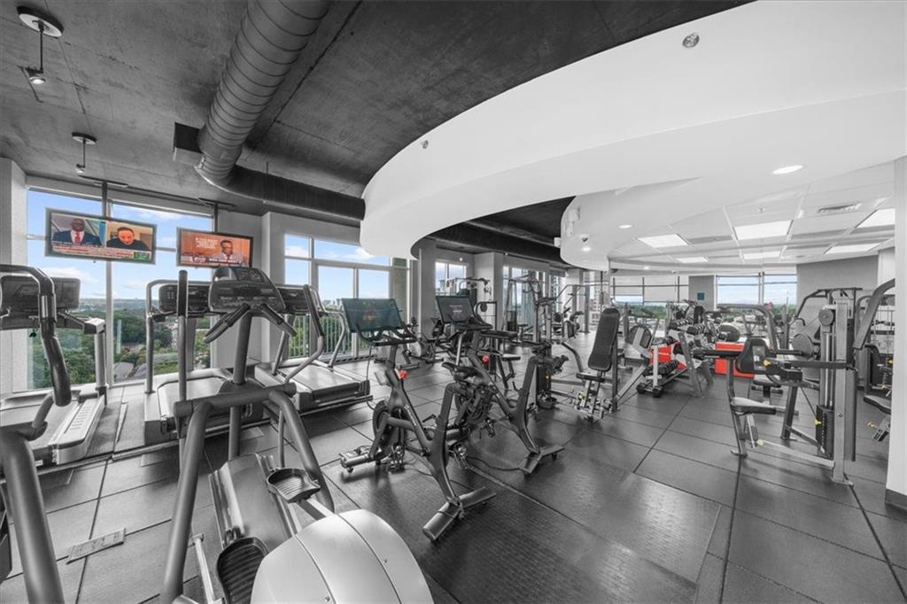250 Pharr Road Northeast, Unit 704 Atlanta, GA 30305 - Photo 47 of 53 a view of a room with gym equipment