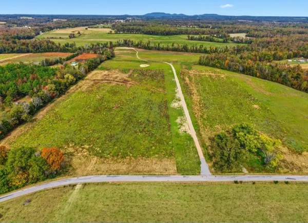 a view of a lake with a outdoor space