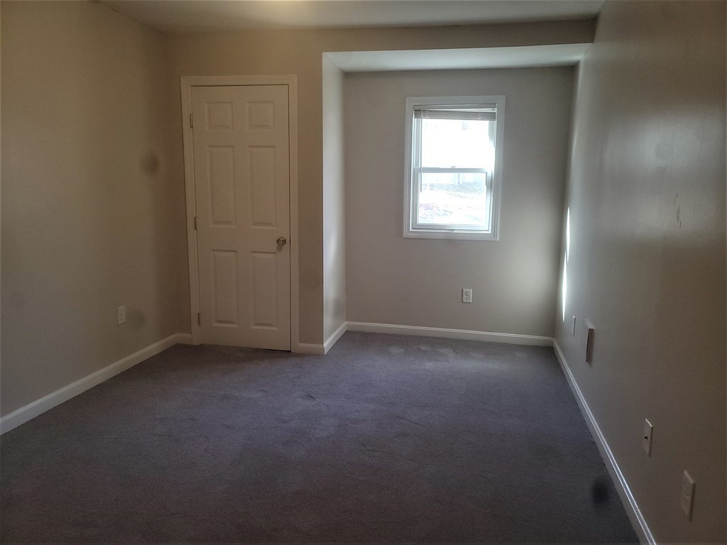 21 Kimball Road Amesbury, MA 01913 - Photo 13 of 23 an empty room that has a window in it
