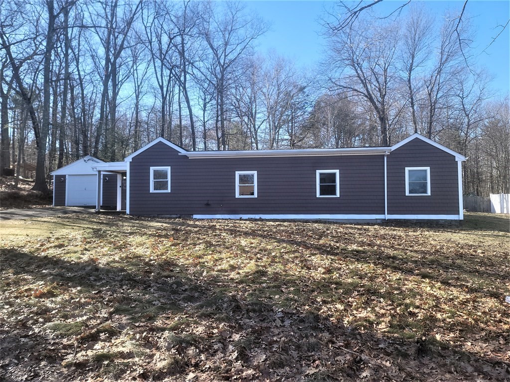 21 Kimball Road Amesbury, MA 01913 - Photo 2 of 23 a front view of a house with a yard