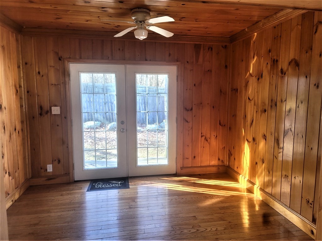 21 Kimball Road Amesbury, MA 01913 - Photo 22 of 23 a view of empty room with wooden floor and fan